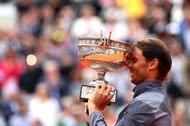 Rafael Nadal poses with the 2019 French Open trophy